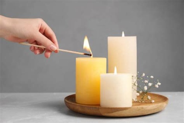 Does lighting a candle help with dust?