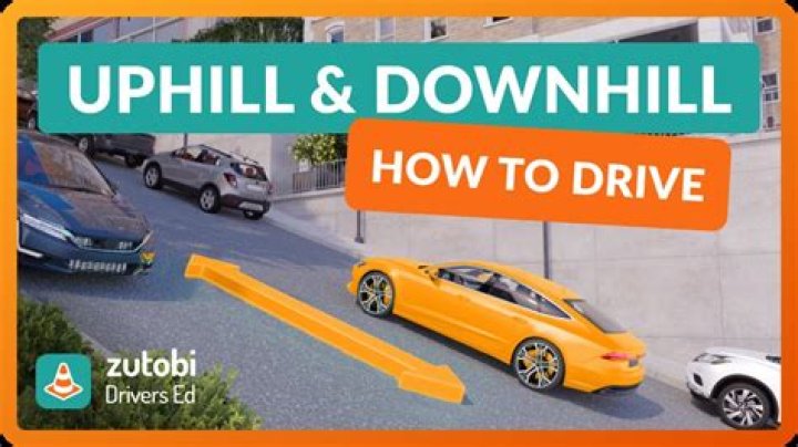 How do you drive a downhill in a manual car?