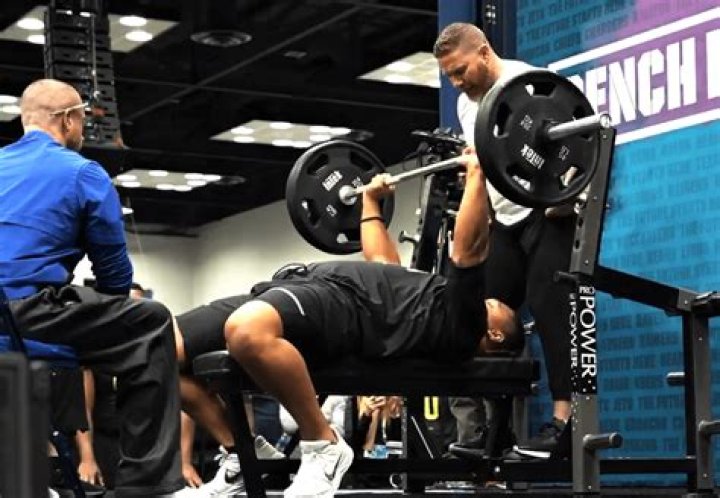 What is John Cena's max bench press?