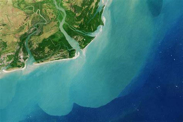Where a river flows into a larger body of water