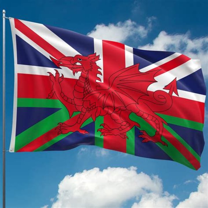 Why is Wales not represented on the royal coat of arms?